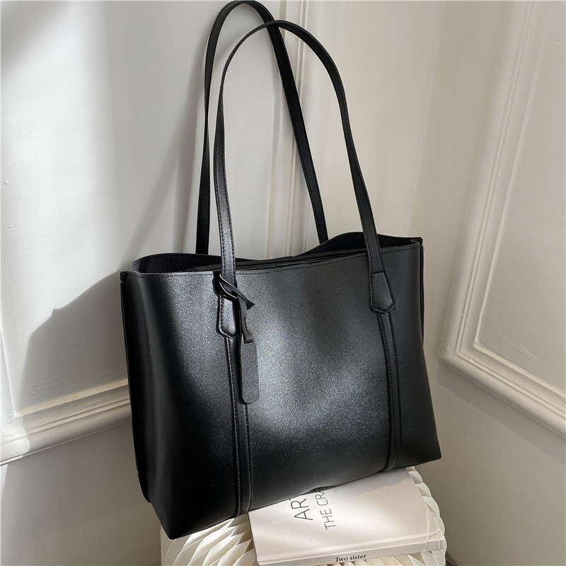 حقيبة يد كلاسيكية سوداء من الج - مراجعة Leather Work Handbag وسعره