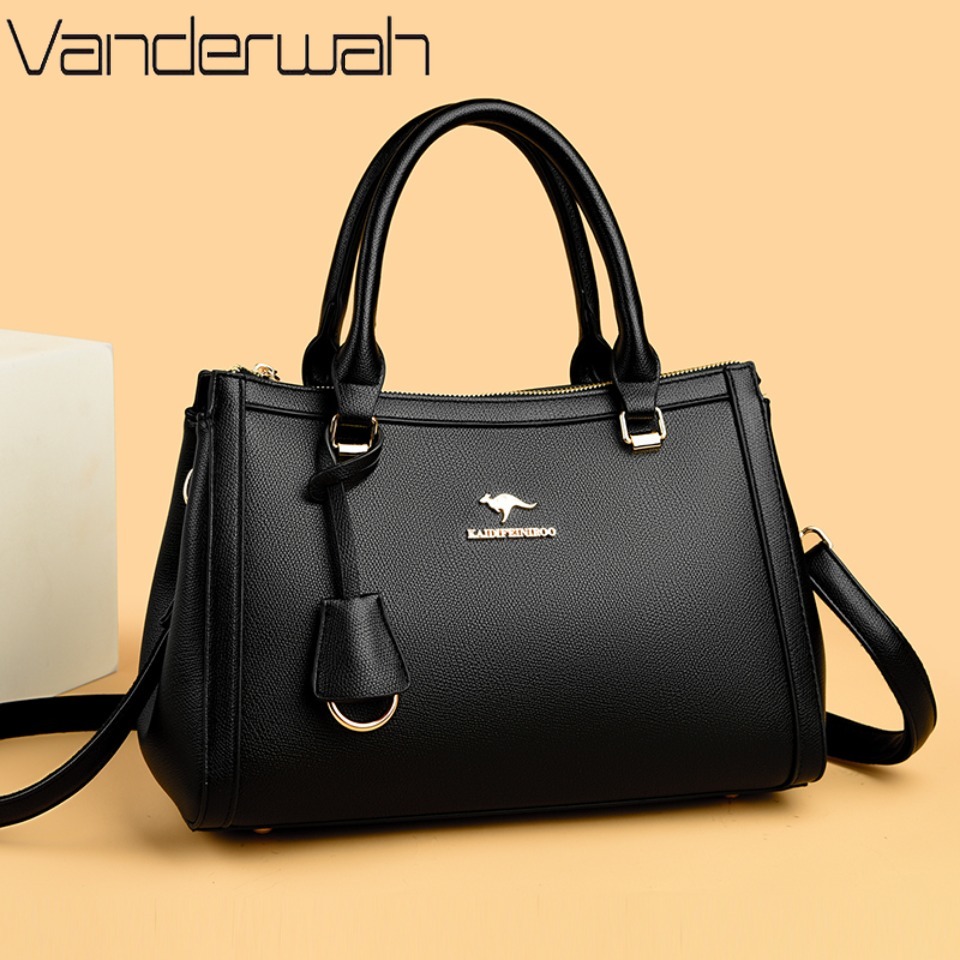 حقيبة يد نسائية من ماركة كانجا - مراجعة Leather Work Handbag وسعره